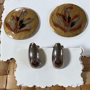 Two earrings, Gold and Black Round Earrings and silver plated oval earrings